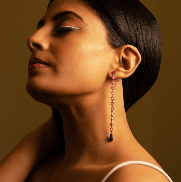 Model wearing BlueStone diamond drop earrings